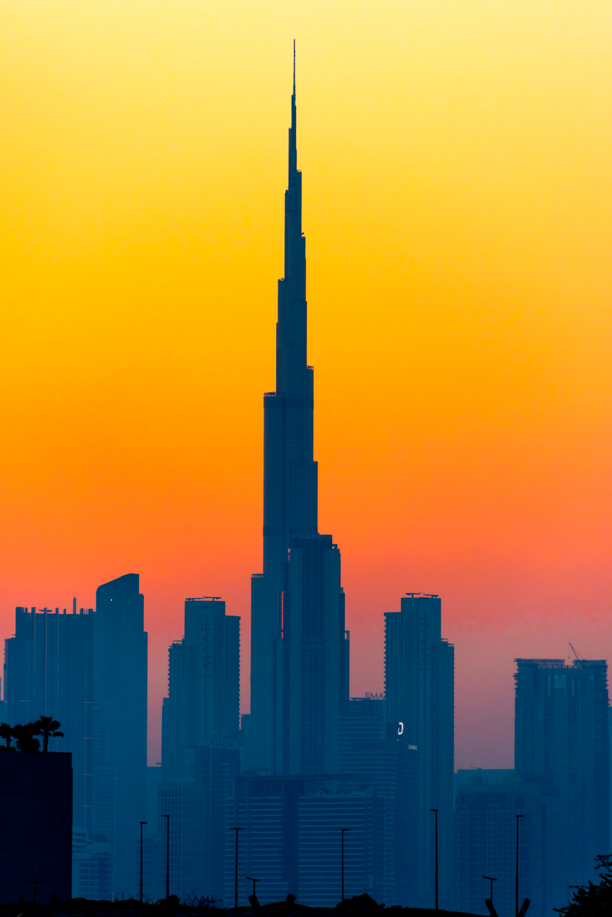 A stunning view of Dubai's skyline featuring Burj Khalifa across the sea.