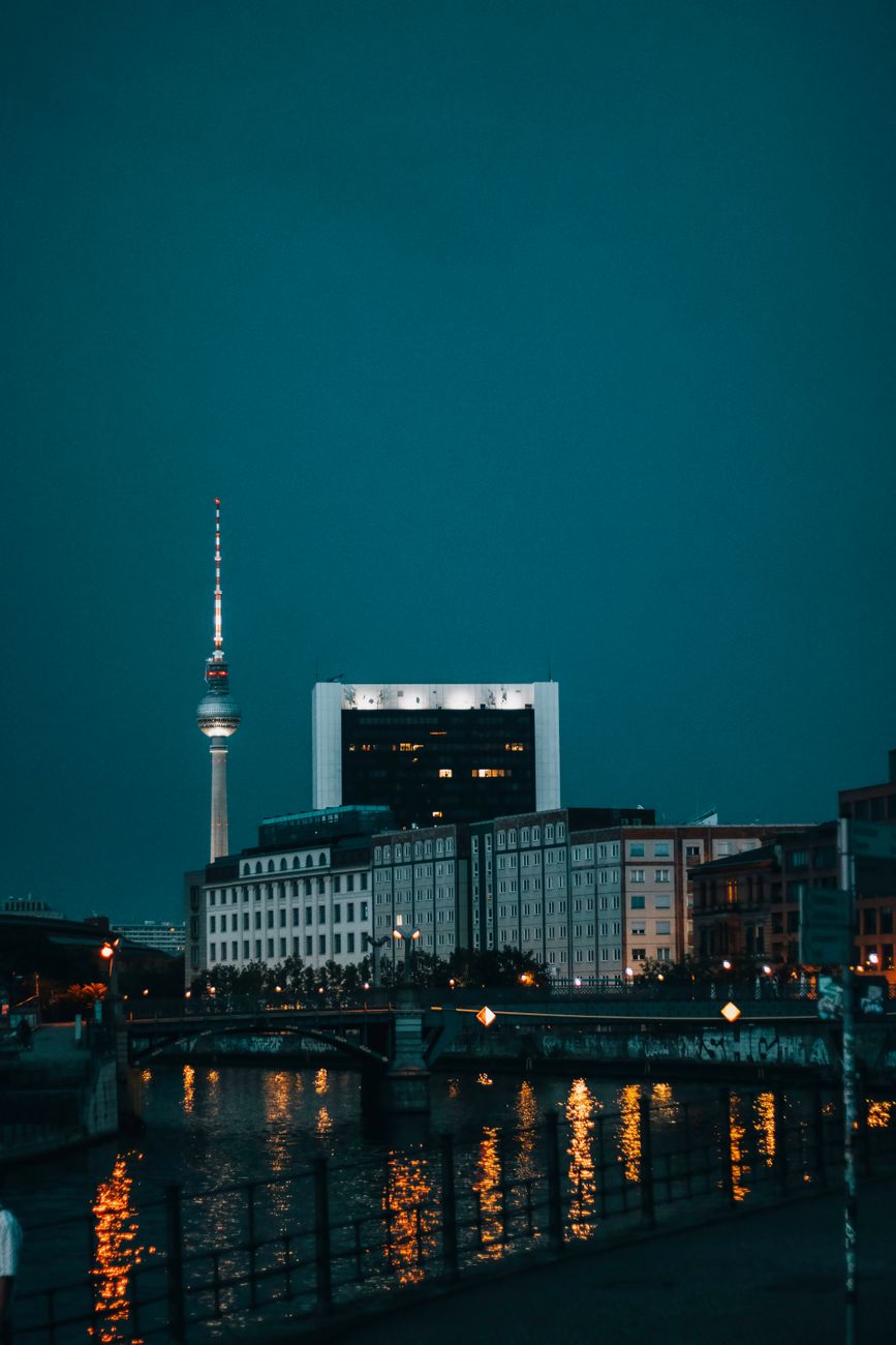 A stunning view of Berlin's historic cityscape featuring the Berlin Cathedral and TV Tower at sunset.